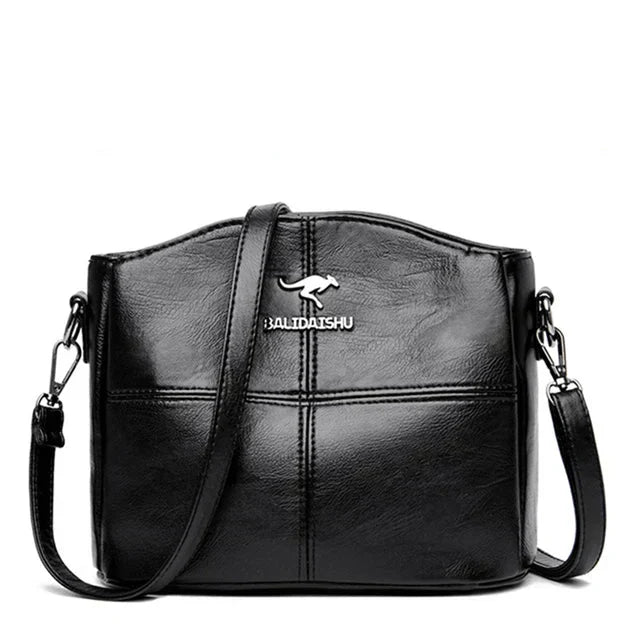 Tyylikäs kirjailtu nahkainen kantolaukku ja crossbody-laukku naisille